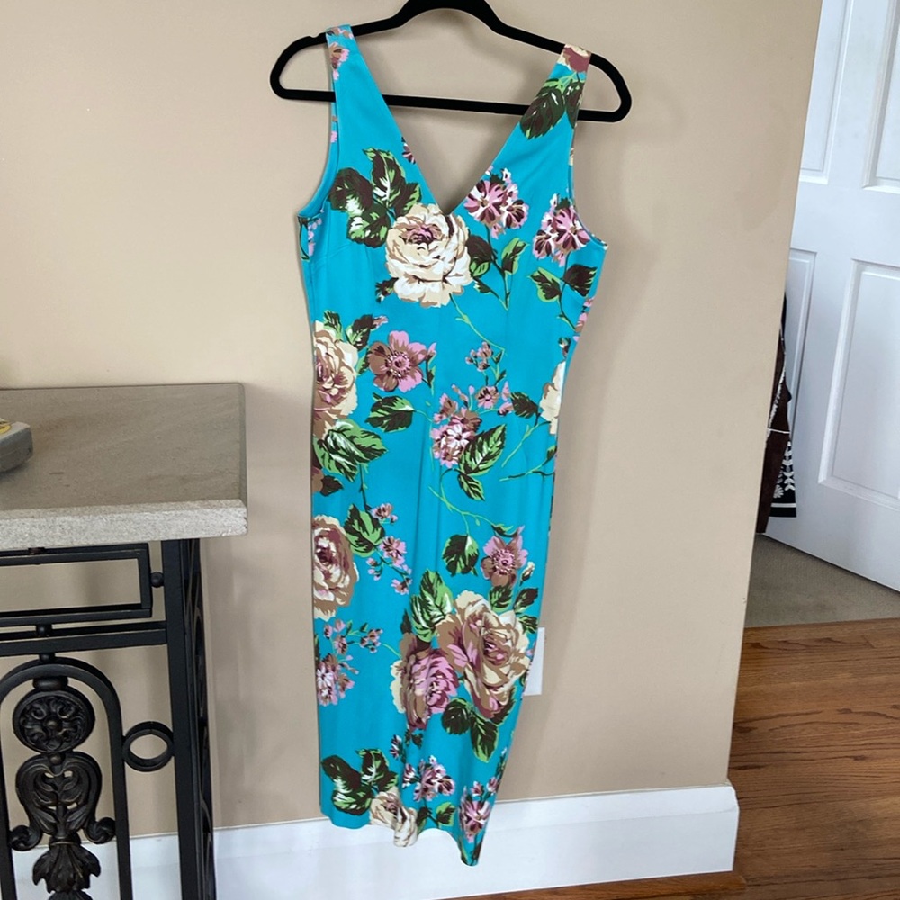 D&G flower dress. Deep back V.  Fits like a 6. Moderate wear.